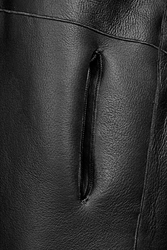 detail Oboustranný dámský kabát, pravá beranní kožešina